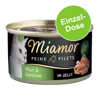 Boîte Miamor Feine Filets Thun & Gemüse in Jelly, texte allemand 'Einzel-Dose', 100 % Filet visible sur l’étiquette, image de chat blanc et filet de thon avec légumes.