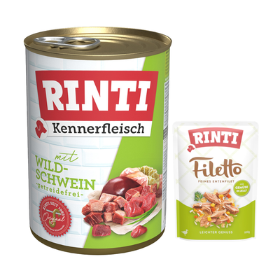RINTI Kennerfleisch cu vânat, fără cereale. Rinti din 1983 Original. Imagine cu bucăți de carne și ingrediente.