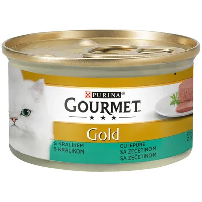 Purina Gourmet Gold Dose mit Kaninchen, Abbildung einer weissen Katze und serviertem Fleischstück auf Teller.