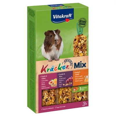 Vitakraft Kräcker Mix pour rongeurs, 3 variétés : fruit & flocons, raisin & noix, miel & épeautre. Image d’un cochon d’Inde et des sticks visibles sur l’emballage.