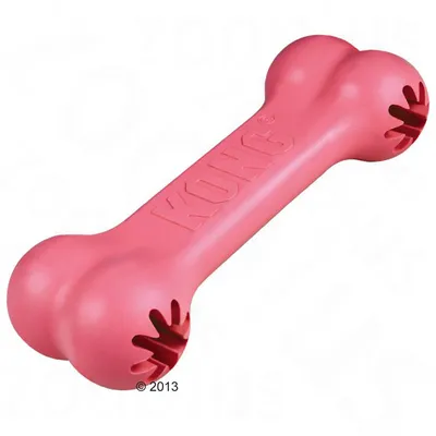 Pink bone-shaped chew toy with the word 'KONG' embossed on it and openings at both ends for treats or chewing.