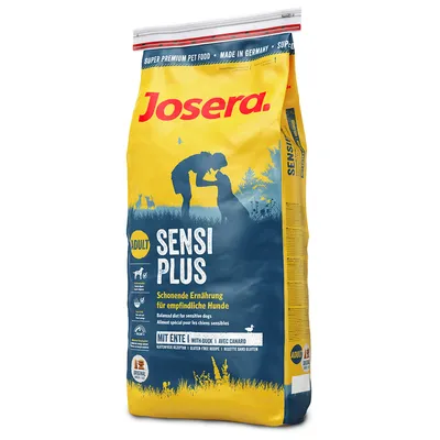 Опаковка Josera Sensi Plus Adult, видим текст: 'Schonende Ernährung für empfindliche Hunde', 'Mit Ente', 'Glutenfreie Rezeptur', изображение на човек с куче. Опаковка Josera Sensi Plus Adult, видим текст: 'Schonende Ernährung für empfindliche Hunde', 'Mit Ente', 'Glutenfreie Rezeptur', изображение на човек с куче.