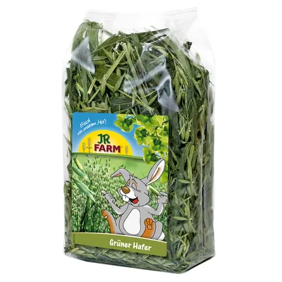 JR Farm Grüner Hafer -pakkaus, läpinäkyvä pussi vihreää kauraa, etiketissä piirroskanin kuva ja teksti 'Frisch vom unserem Hof!' sekä 'Grüner Hafer'.
