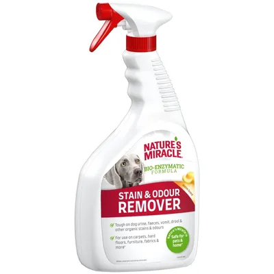 Spray Nature's Miracle Bio-Enzymatic Formula Stain & Odour Remover, testo visibile: per tappeti, pavimenti, mobili, tessuti; sicuro per animali e casa. Testo in inglese sull'etichetta.