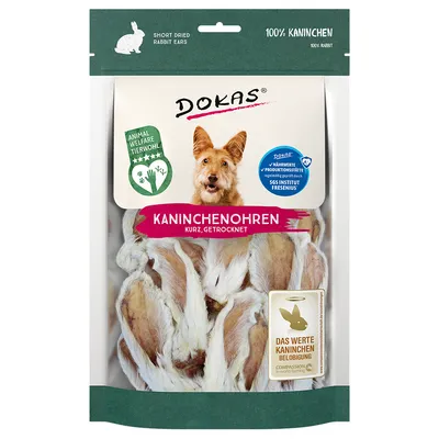 Bolsa de orejas de conejo secas Dokas. Texto visible: 'KANINCHENOHREN KURZ, GETROCKNET', '100% KANINCHEN', 'Animal Welfare Tierwohl', varios sellos y certificaciones en alemán.