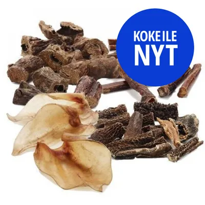 Erilaisia kuivattuja koiranherkkuja, päällä sininen ympyrä, jossa valkoinen teksti: KOKEILE NYT