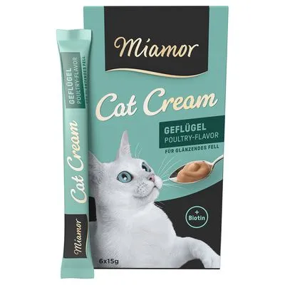 Miamor Cat Cream, smaak gevogelte, met biotine. Verpakking toont een witte kat, lepel met crème en tekst: 'GEFLÜGEL POULTRY-FLAVOR', 6x15g. Voor glanzende vacht.