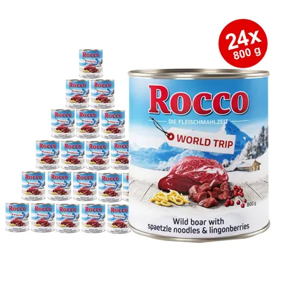 Rocco World Trip blik, 24 x 800 g. Tekst op blik: 'Wild boar with spaetzle noodles & lingonberries'. Afbeelding van vlees, noedels en bessen op de verpakking.