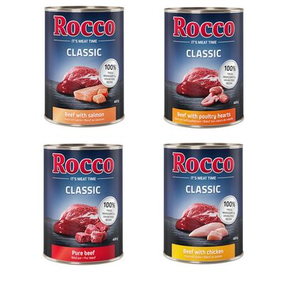 Rocco Classic pure beef, 24 x 400 g dåser. Synlig tekst: 100% fresh ingredients & grain-free, Rind pur, Bœuf pur. Billede af oksekød på dåseetiket.