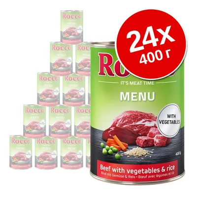 24 банки по 400 г Rocco Menu Beef with vegetables & rice. На этикетке изображены мясо, горох, морковь и рис. Видна надпись: WITH VEGETABLES.