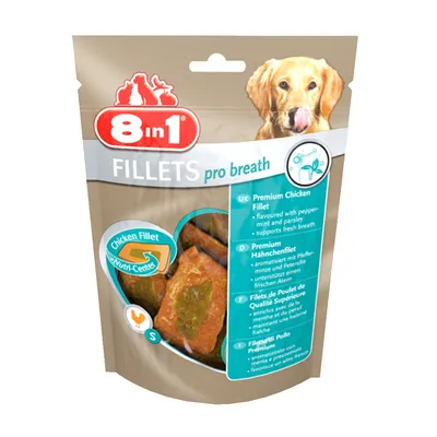 8in1 FILLETS pro breath, Chicken Fillet Nutri-Center, afbeelding van hond en kipfilets zichtbaar op de verpakking. Engelstalige tekst: Premium Chicken Fillet, supports fresh breath.
