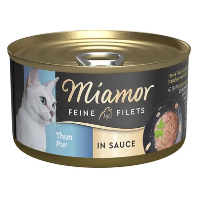 Boîte de nourriture pour chat Miamor Feine Filets Thun Pur In Sauce, image d’un chat blanc et filet de thon en sauce visibles sur l’étiquette.