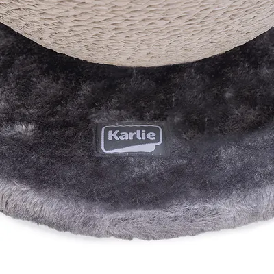 Karlie logo on grey, fluffy fabric base of a scratching post.