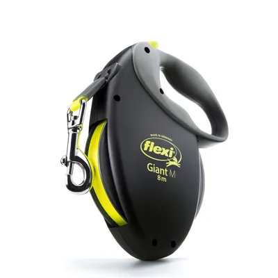 Laisse enrouleur noire et jaune flexi Giant M 8 m, texte visible : Made in Germany, mousqueton métallique, poignée ergonomique.
