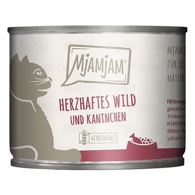 MjAMjAM dåse med teksten 'Herzhaftes Wild und Kaninchen', 'Getreidefrei' og silhuet af kat. Synlig tekst på tysk. Kattemad i dåse.