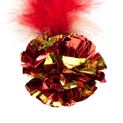 Toy ball made of shiny red and gold material with red feathers on top.