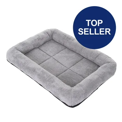 Graues, rechteckiges Haustierbett mit weichem Rand. Blauer Kreis mit weissem Text 'Top Seller'. Graues, rechteckiges Haustierbett mit weichem Rand. Blauer Kreis mit weissem Text 'Top Seller'.