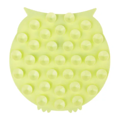 Gelbe, eulenförmige Silikonmatte mit erhöhten Noppen für Massage oder Fütterung.