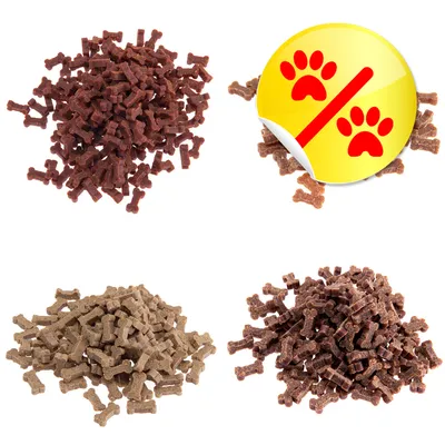 Trois tas de friandises pour chien en forme d’os, de couleurs différentes. Pastille jaune avec deux empreintes rouges et une barre oblique, indiquant une offre ou promotion.