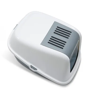 Closed cat litter box made of white plastic with grey filter insert and transparent swing door.