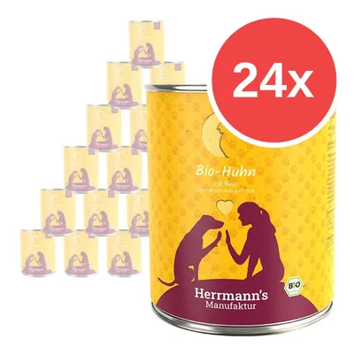 24x konzerv Herrmann's Manufaktur Bio-Huhn mit Reis, žluté balení s fialovým motivem psa a člověka, nápisy Bio-Huhn mit Reis, Organic chicken with rice, Bio. 24x konzerv Herrmann's Manufaktur Bio-Huhn mit Reis, žluté balení s fialovým motivem psa a člověka, nápisy Bio-Huhn mit Reis, Organic chicken with rice, Bio.