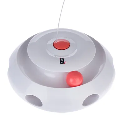 Juguete blanco con bola roja y botón rojo, marca Trixi. Forma redonda con aberturas para juego interactivo.