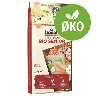 bosch BIO SENIOR hundefoder, ab dem 7. Lebensjahr, 19 % protein, 8 % fedt, 35 % frisches Bio-Hühnchen, ØKO-mærke, 11,5 kg, synlige ingredienser som gulerødder og kylling.