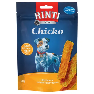 Opakowanie Rinti Extra Chicko, 100% Huhn-Filet, 90 g, knusprige Hähnchenstreifen, wenig Fett ohne Zucker. Widoczny wizerunek psa i kawałki przysmaku z kurczaka.