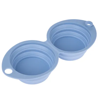 Double foldable silicone bowl in blue, suitable for food or water. With two holes for hanging or carrying.