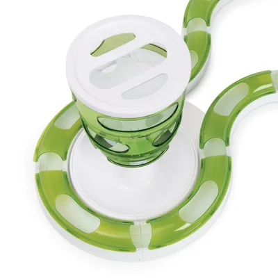 Giocattolo verde con tubi trasparenti e coperchio bianco, adatto per gioco interattivo o distribuzione di cibo.