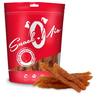 Snack-O-Mio, sachet rouge avec morceaux de viande visibles. Texte allemand : Zarte Hühnerbrust Filetstreifen. Icônes : extra viel Fleisch, natürliche Rohstoffe.