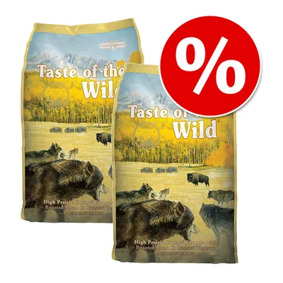To poser Taste of the Wild High Prairie Canine Formula with Roasted Bison & Roasted Venison hundefoder, stor rød procent-tegn viser tilbud eller rabat
