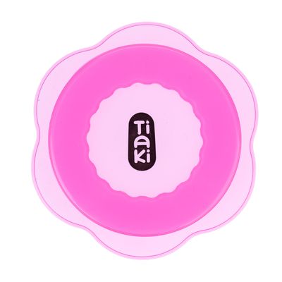 Tiaki pink bowl with flower-shaped design, suitable for pet food or water.