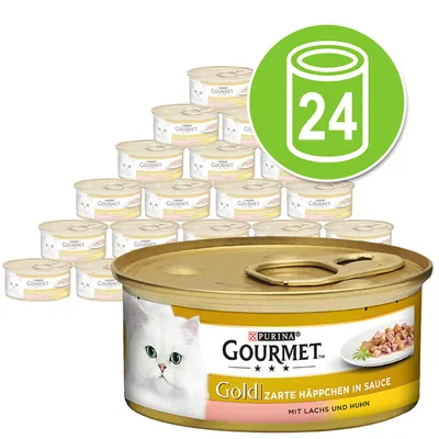 Pack de 24 latas de comida para gatos Purina Gourmet Gold Zarte Häppchen in Sauce mit Lachs und Huhn. Imagen de una lata con foto de un gato blanco y trozos en salsa.