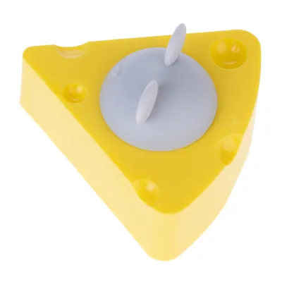 Yellow triangular cheese-shaped toy with grey suction cup and two white pegs on top.