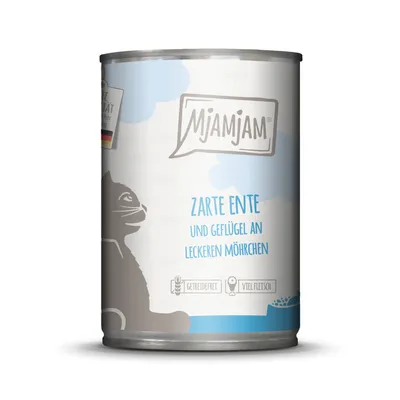 Boîte MjAMjAM, texte visible en allemand : Zarte Ente und Geflügel an leckeren Möhrchen, pictogrammes grain et viande, illustration de chat. Texte non traduit.