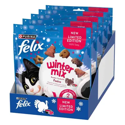 Purina Felix Winter Mix Snacks, edição limitada, com sabor a peru e arando. Embalagem com motivos festivos e imagem de gato. Purina Felix Winter Mix Snacks, edição limitada, com sabor a peru e arando. Embalagem com motivos festivos e imagem de gato.
