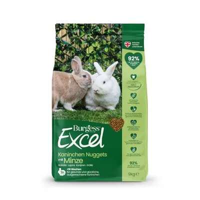 Burgess Excel Kaninchen Nuggets mit Minze, 9 kg zak. Tekst: 92% vezels uit gras en hooi, voor gezonde tanden, geschikt vanaf 16 weken. Afbeelding van twee konijnen op de verpakking.