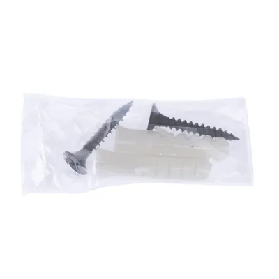 Set composto da due viti nere e due tasselli bianchi in una busta di plastica trasparente.