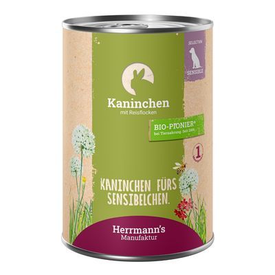 Blik Herrmann's Manufaktur Kaninchen mit Reisflocken, tekst: Kaninchen fürs Sensibelchen, BIO-PIONIER, Selection Sensible, groene en paarse accenten op het etiket.