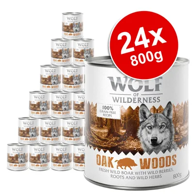 Wolf of Wilderness Oak Woods 24x800g tins, 100% grain-free recipe, fresh wild boar with wild berries, roots and wild herbs. Large red label shows pack size. Brand and product text visible.