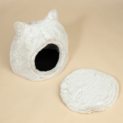 Mäkká biela plyšová búda s odnímateľným okrúhlym vankúšom. Vhodné pre domáce zvieratá na spanie alebo schovávanie.