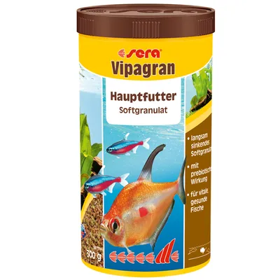 Sera Vipagran Hauptfutter Softgranulat, банка 300 г. Видны изображения аквариумных рыб и гранулированного корма. Текст на немецком: langsam sinkendes Softgranulat, mit prebiotischer Wirkung.