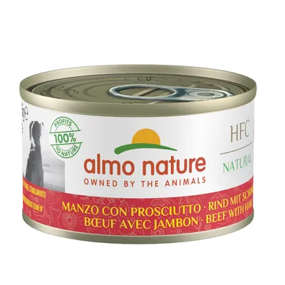Almo Nature HFC Natural nötkött med skinka, 100% Profits to Nature, burk med röd etikett och gul logotyp.