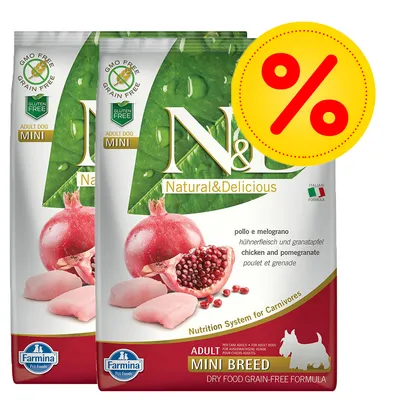 To poser Farmina Natural & Delicious Adult Mini Breed kornfri tørfoder med kylling og granatæble, synligt mærket GMO free, gluten free og stort procenttegn for tilbud.