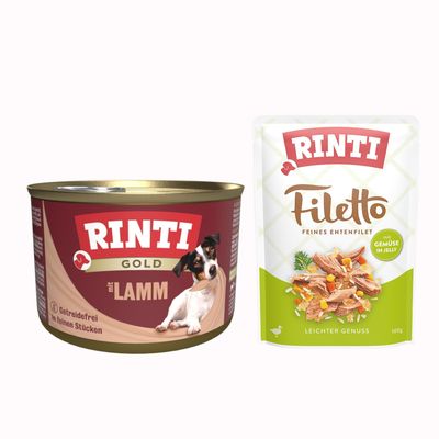 RINTI Gold mit Geflügelherzen, getreidefrei, in feinen Stücken. Abbildung einer Dose mit Hund auf der Verpackung.