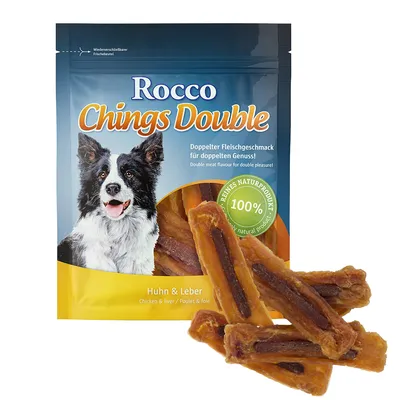 Лакомство для собак Rocco Chings Double, курица и печень. На упаковке изображён пёс, видны кусочки лакомства и надпись: 100% reines Naturprodukt.