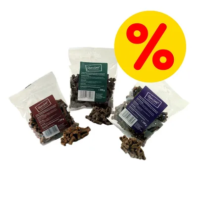 Kolme Chewies-merkkistä koiranherkkupussia, pakkauksissa näkyvät tuotenimet ja painot 200 g. Keltainen alennusmerkki oikeassa yläkulmassa.
