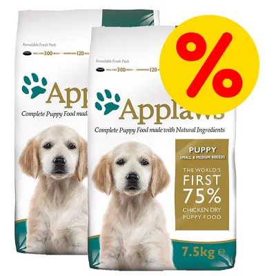 To poser Applaws Complete Puppy Food, 7,5 kg, med teksten 'Puppy Small & Medium Breeds', 'The world's first 75% chicken dry puppy food' og gult procenttegn for tilbud.