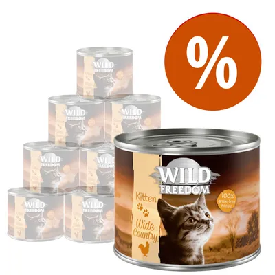 Pack de latas Wild Freedom Kitten Wide Country, 100% grain-free recipe, com imagem de um gato e símbolo de percentagem a indicar promoção.